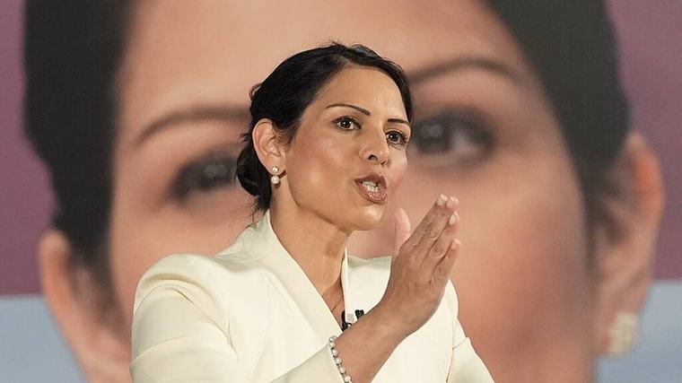 Priti Patel returns to back benches to take on ‘international role’