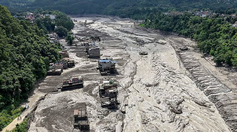 Chinese rescue team finds 'nothing but ruins' at flood-hit Himalayan border crossing