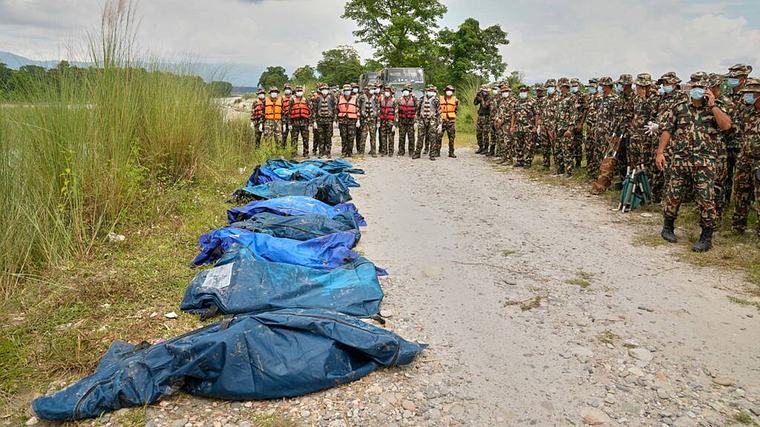 Hundreds feared stuck in hydropower tunnels as Nepal/China flood deaths pass 950