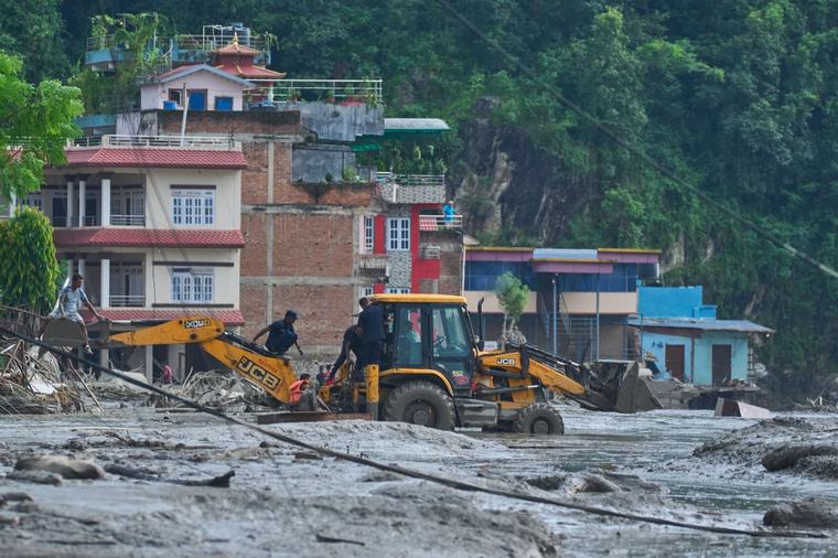 Rescuers search for dozens of Britons among those missing in Nepal after floods