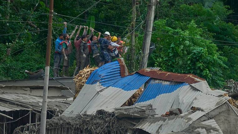 Rescuers urged to remain on high alert after dam bursts banks again in Nepal