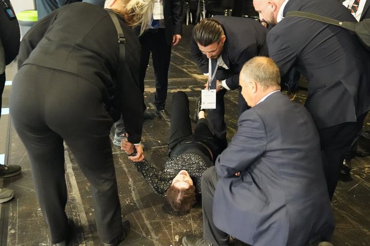 Protesters interrupt Nigel Farage’s conference speech