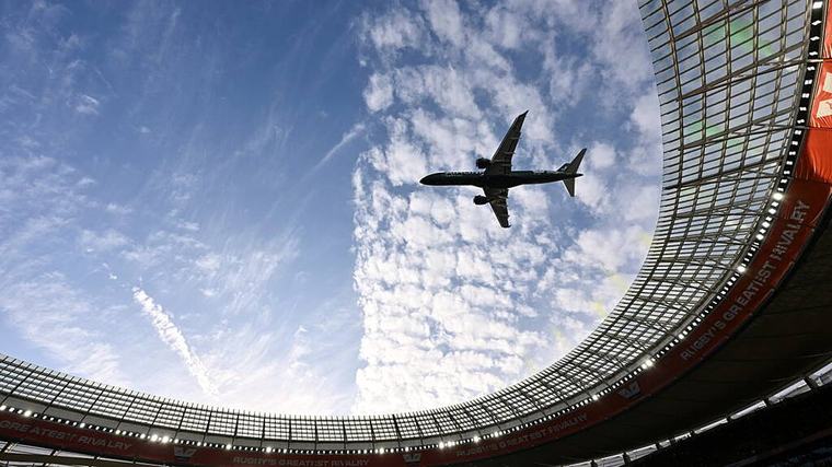 Low flyby by jets over packed South African stadium sparks safety debate