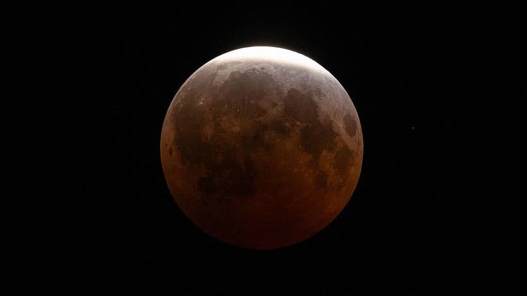In pictures: Moon turns blood red in lunar eclipse